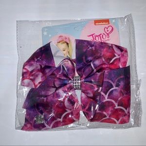 Jojo Siwa bow by Nickelodeon. New in package.